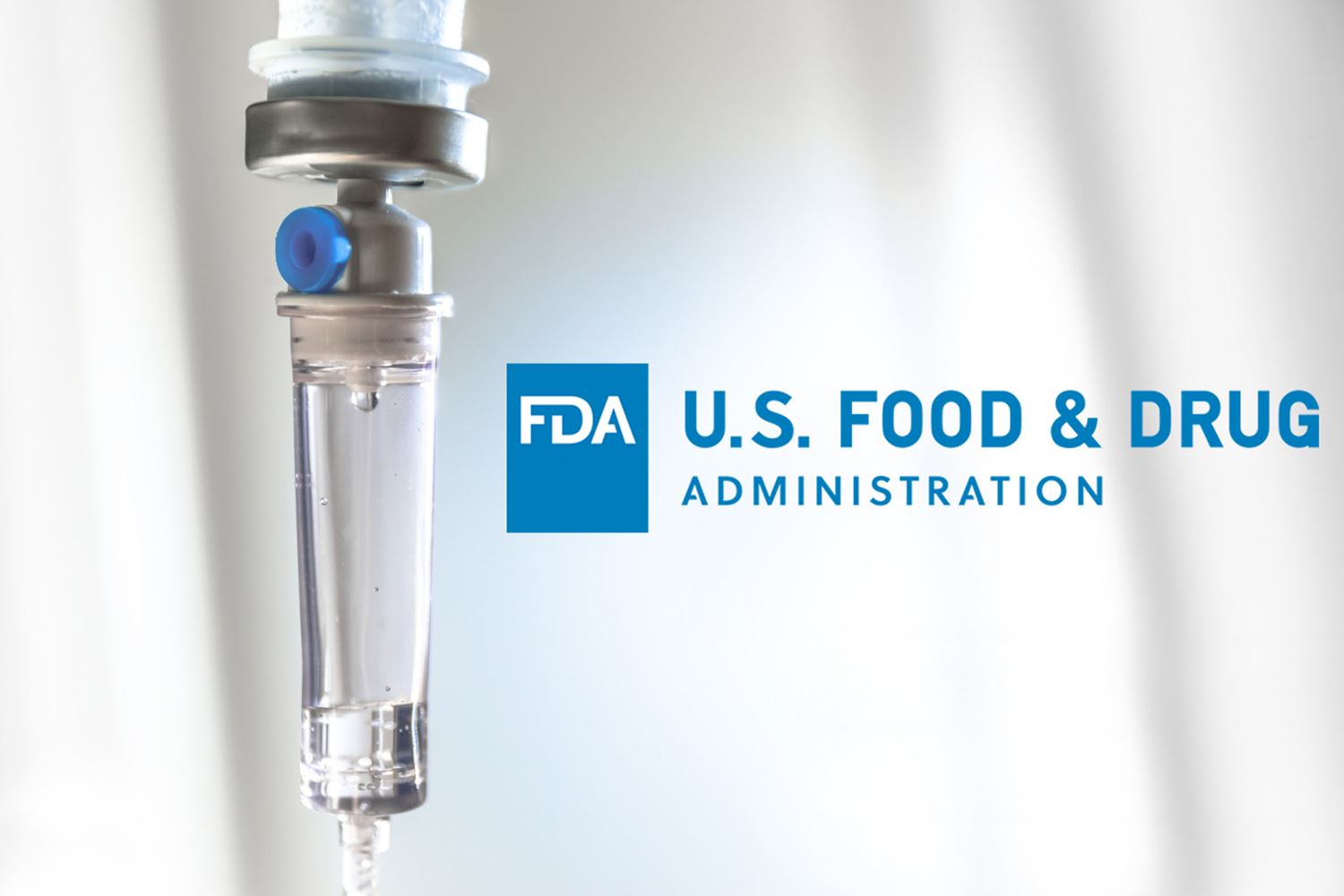 IV drip chamber with a drop of liquid falling inside, next to the U.S. Food & Drug Administration (FDA) logo on a light background.